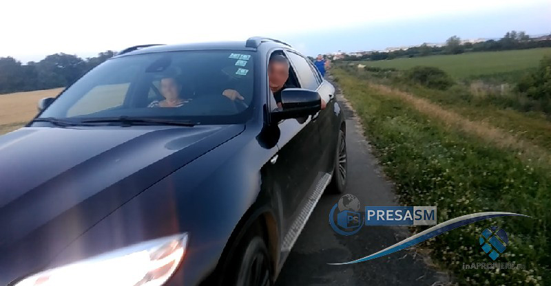 FOTO&VIDEO. Scandal pe dig în Satu Mare! Un JMEKER cu BMW ia la bani mărunți oamenii