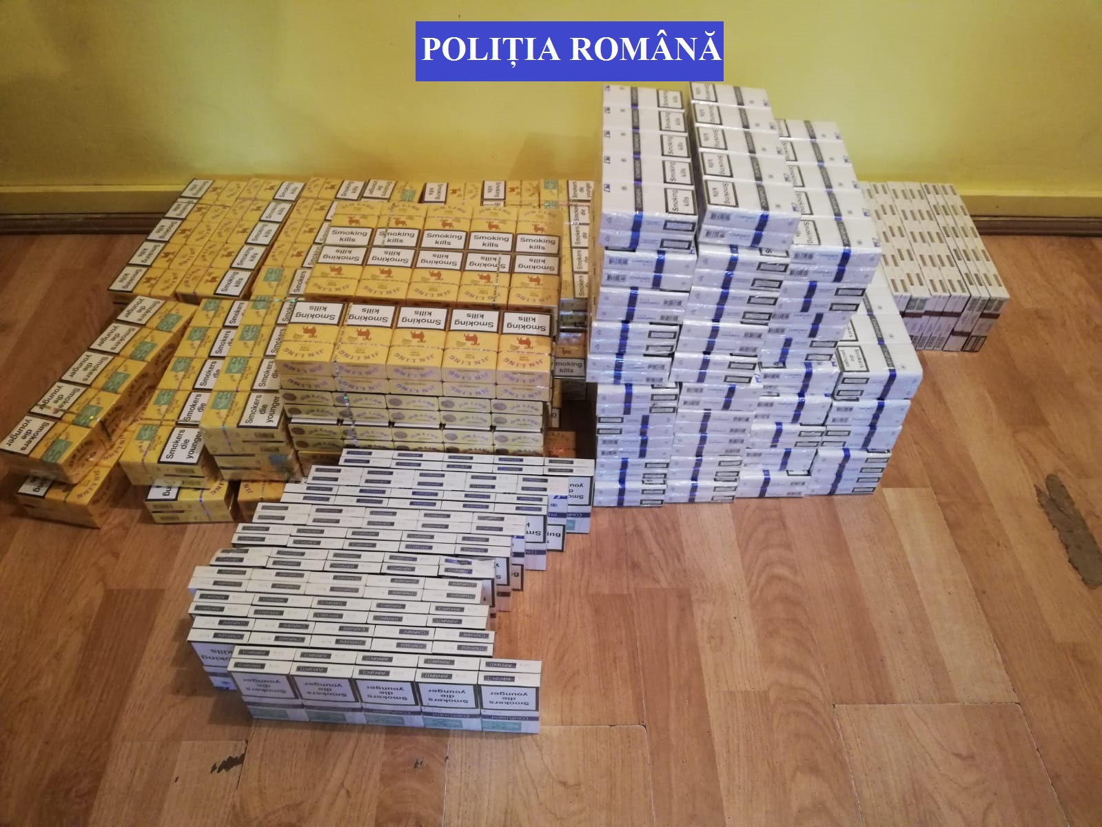 FOTO. Femeie prinsă de ”mascați” cu sute de pachete de țigări de contrabandă