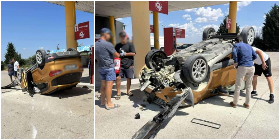 FOTO. O mașină a ajuns cu roțile în sus într-o benzinărie și a luat foc. Accident în județul vecin