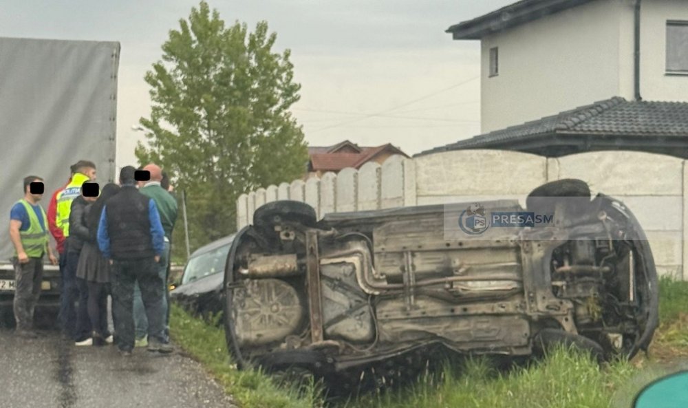FOTO. Se caută eroul care a salvat o femeie din mașina răsturnată în Satu Mare